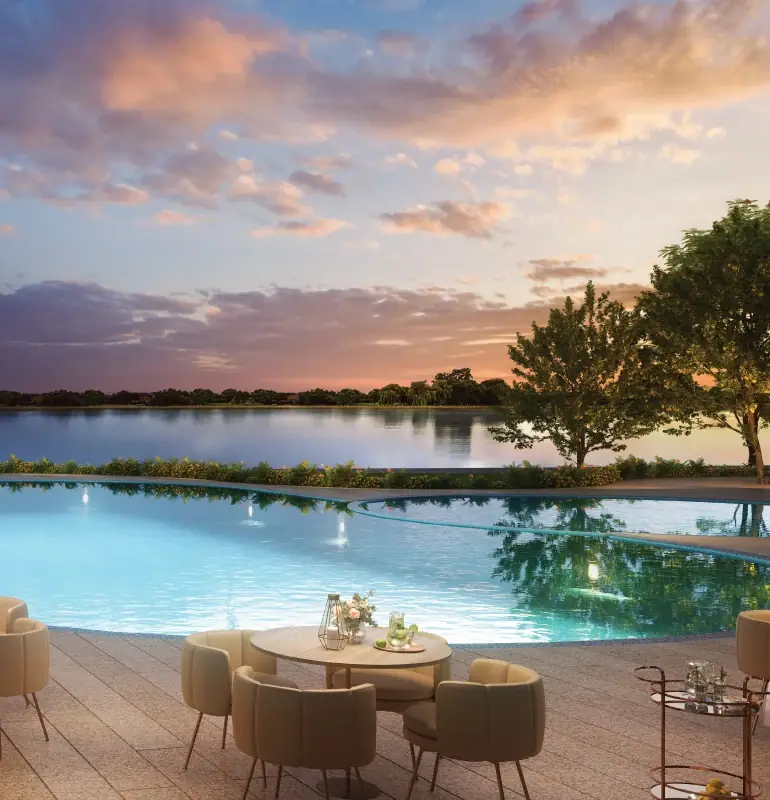 Lodha Elanza, Sarjapur Road Pool bar and swimming pool beside a lake at sunset, Lodha Elanza
